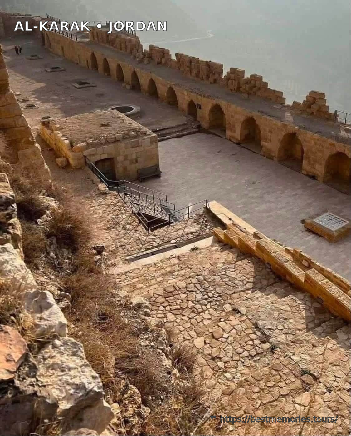 Arched courtyard and archaeological stonework at Al-Karak Castle, Jordan