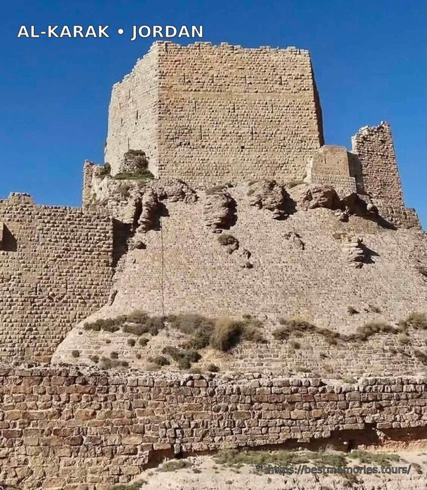 Tower and massive stone walls of Al-Karak Castle, Jordan
