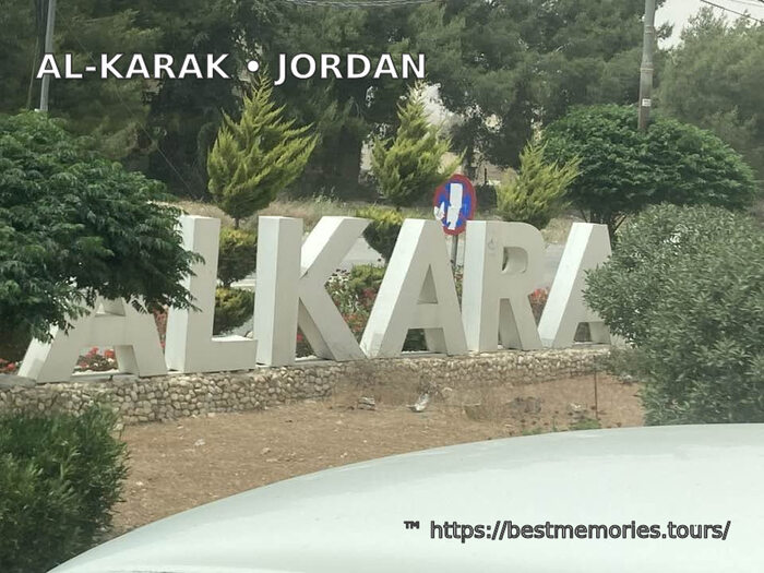 Al-Karak town sign in Jordan near the historic Crusader castle