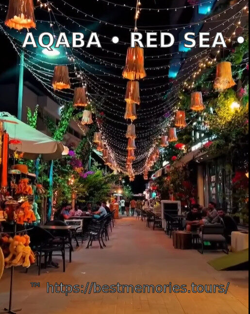 Aqaba Old Town souk with restaurants, cafés and evening lights — Jordan travel experience