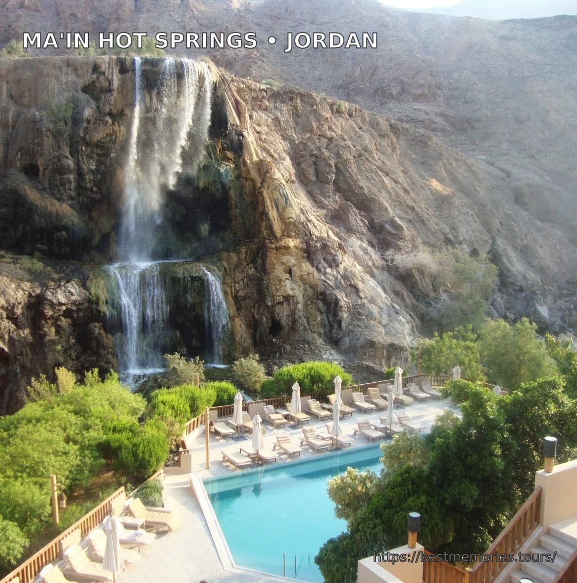 Ma'in Hot Springs waterfall, gardens and turquoise pool from above