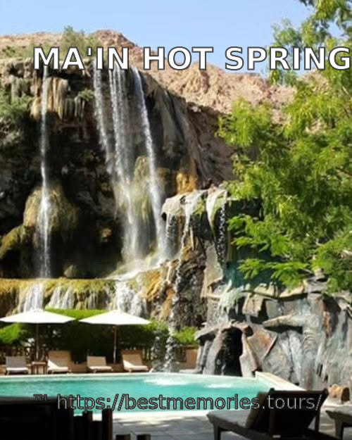 Poolside view beneath a thermal waterfall at Ma'in Hot Springs, Jordan
