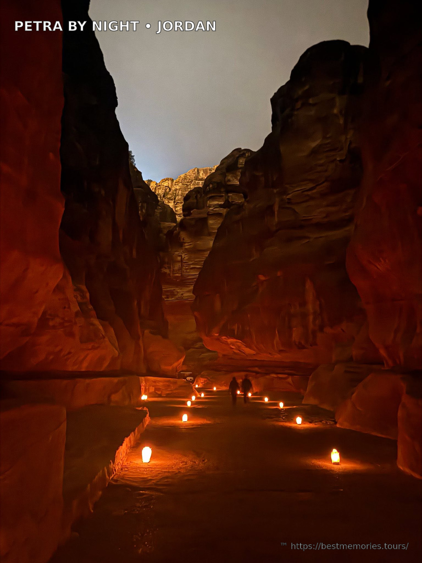 Petra by Night sandstone canyon and illuminated Treasury approach in Jordan